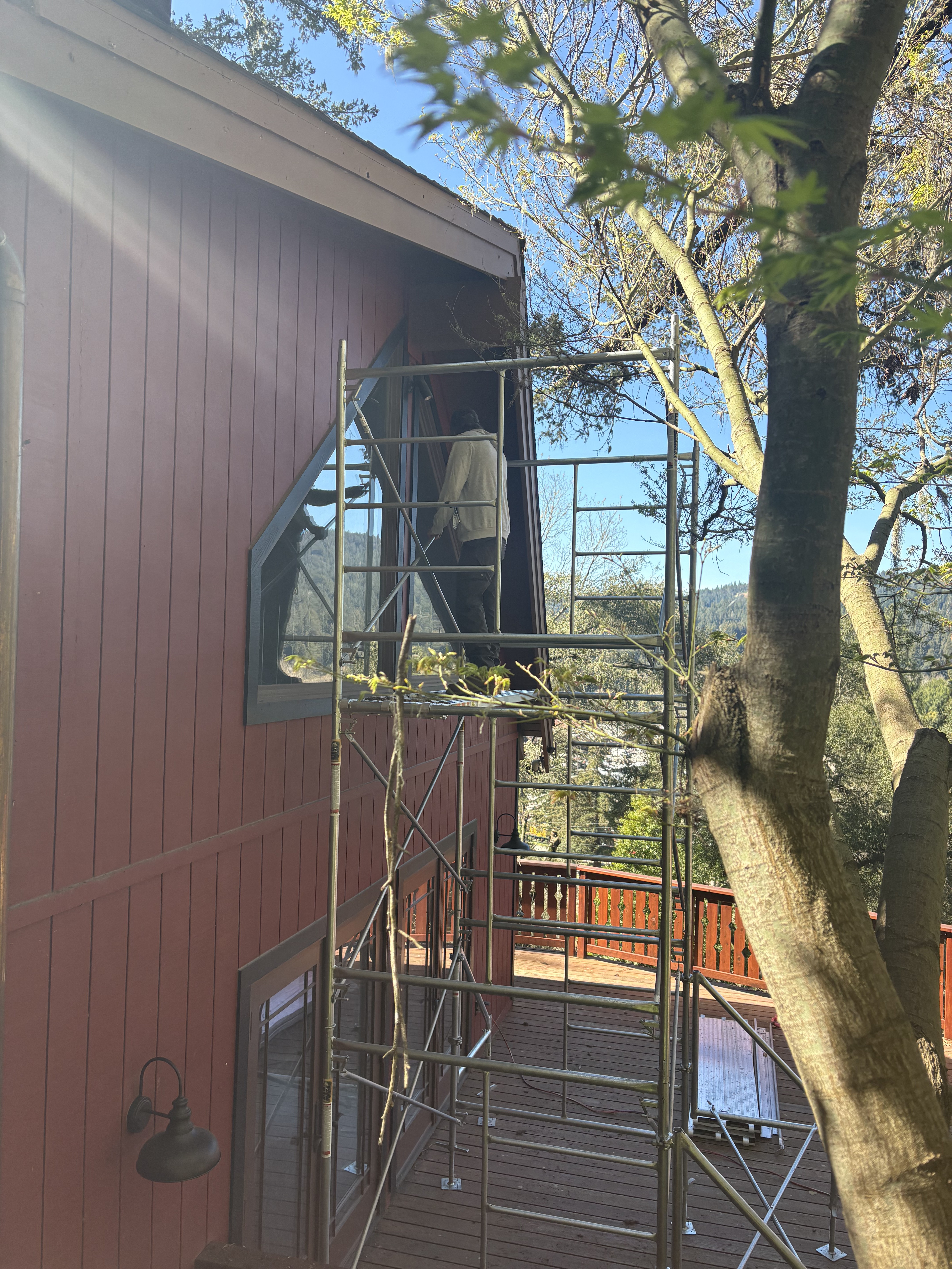 Exterior repair work on a wood-sided home in San Jose.