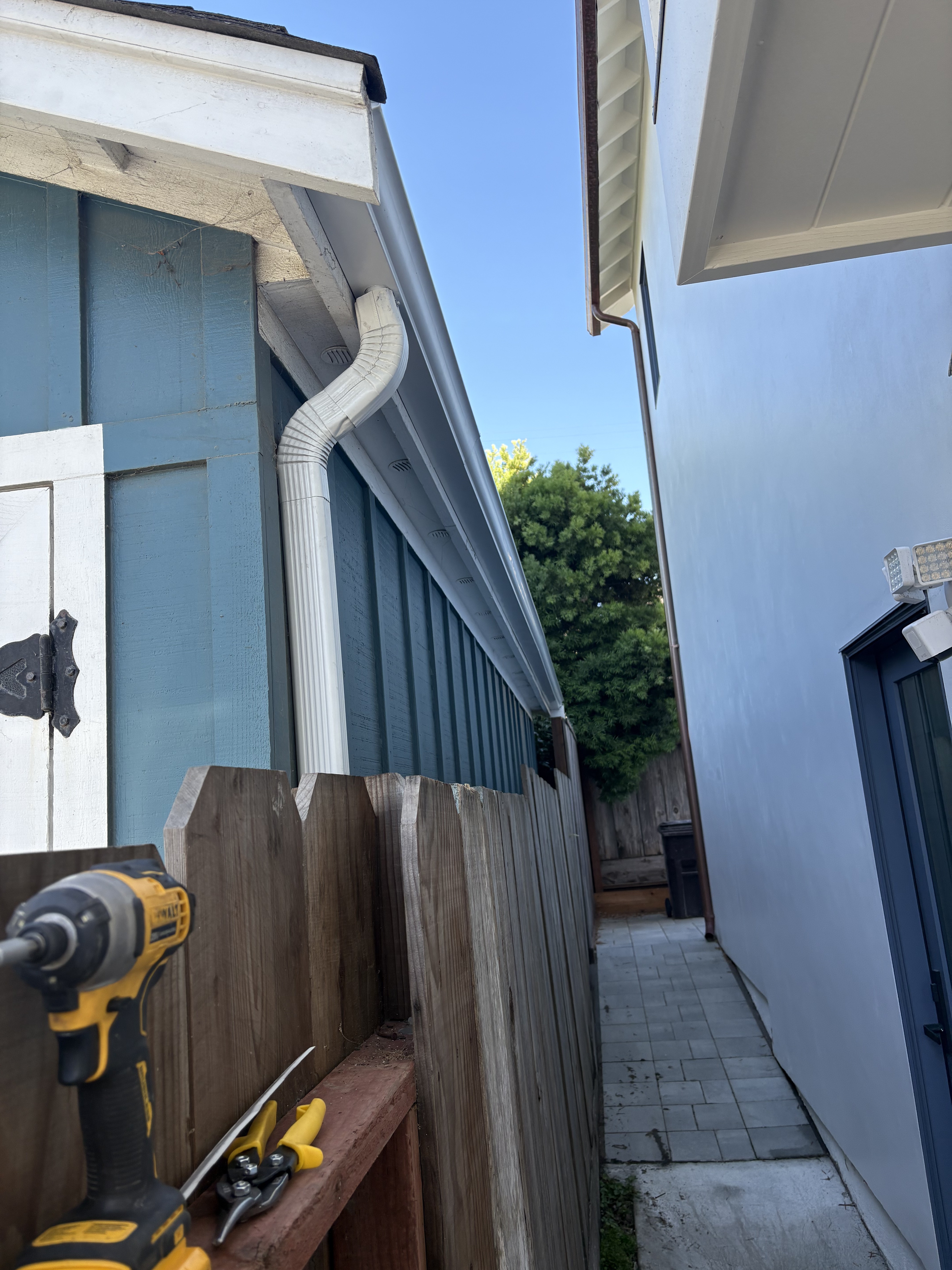 Tight-access exterior repair work on a Morgan Hill residential property.