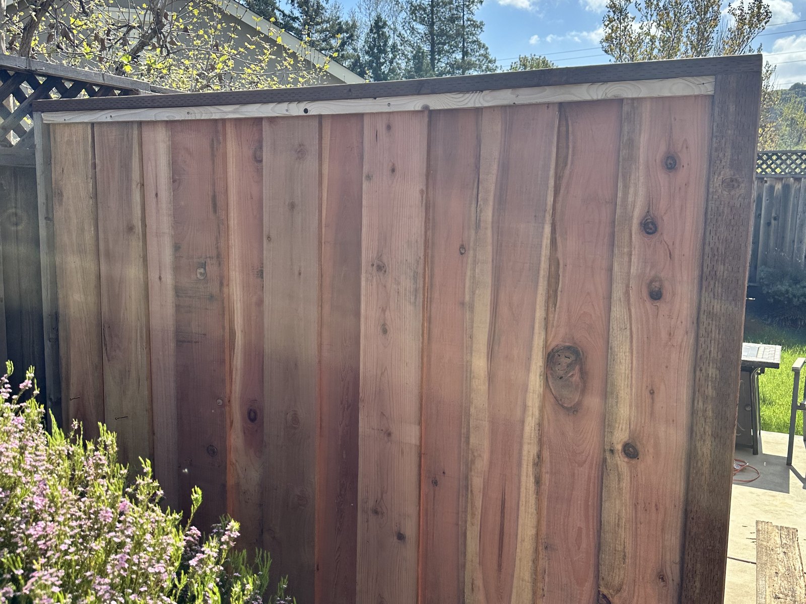 Completed wood fence and gate project by Big Iron Construction